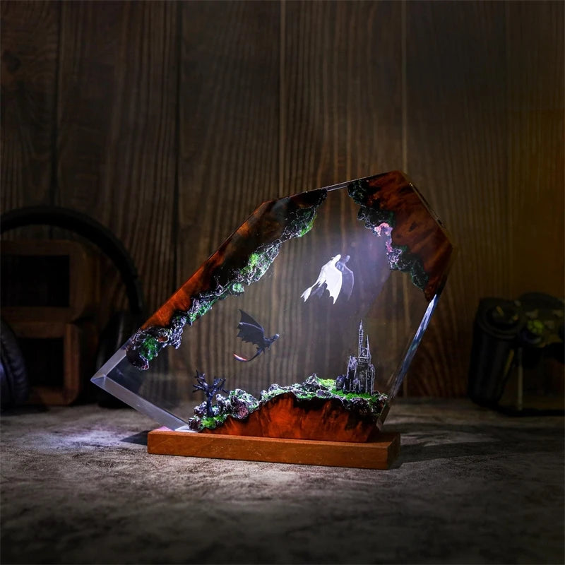Angled view of pale birds crossing above a distant spire in clear resin with layered depth and cool violet and blue light