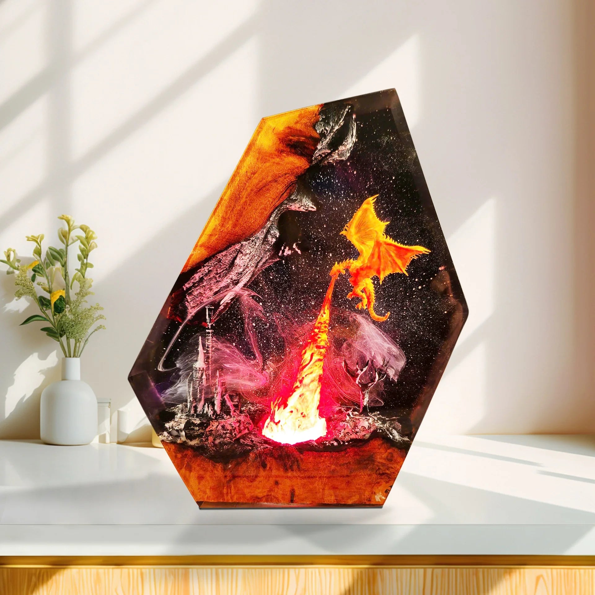 Alternate view of fire dragon circling a burning citadel inside resin showing the material edge and internal lighting