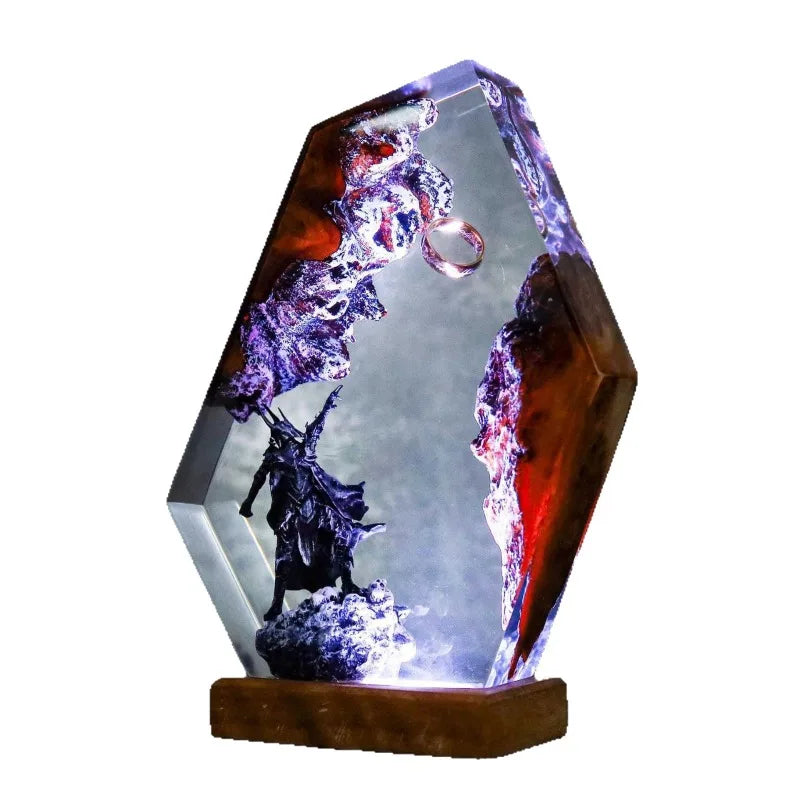 Studio view of armored shadow sovereign beneath a suspended ring in resin on its display base with controlled illumination